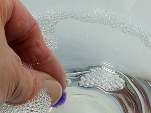 5. Dip Mini Felt Bead Into Soapy Water