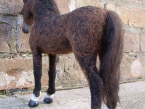 Brown horse created using needle felt