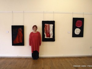 Deborah with her designs