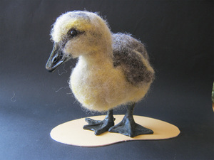 Gosling - Joan's first needle felted 3D bird. The bill and feet are modelled from Fimo and then carved and painted.