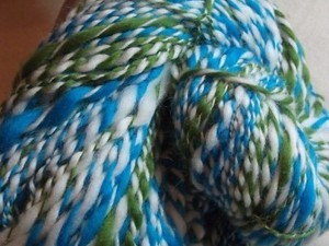 Green, white and blue plaited yarn