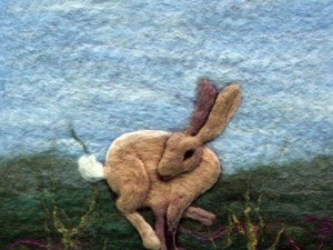 Rabbit in the field made using felt material